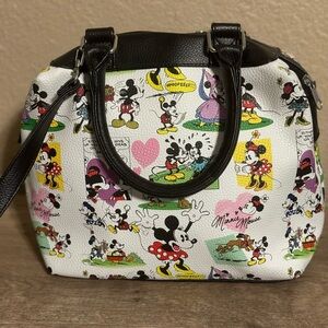 Disney purse 9” tall 10” long and 6” wide. 9” deep on the inside.